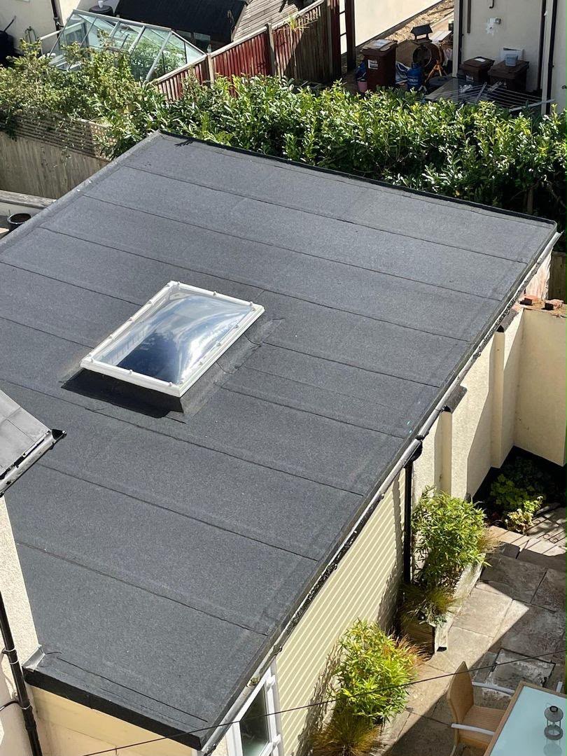 Dark flat roof with rooflight